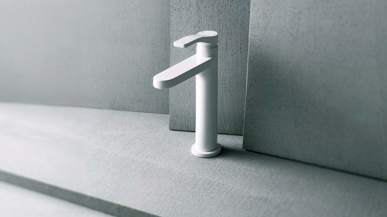 Chrome AL/23 single-hole lavatory faucet by Fantini in front of raw gray concrete