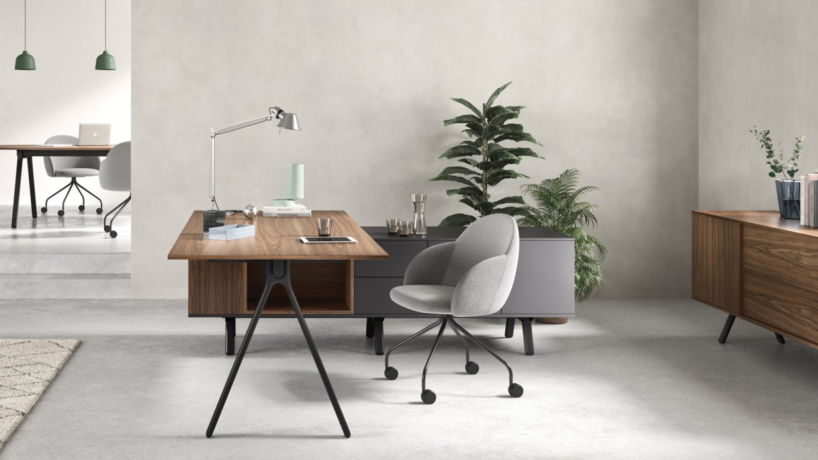 Designer office desks Lay by Archiutti with light gray tops and red frame in an open office