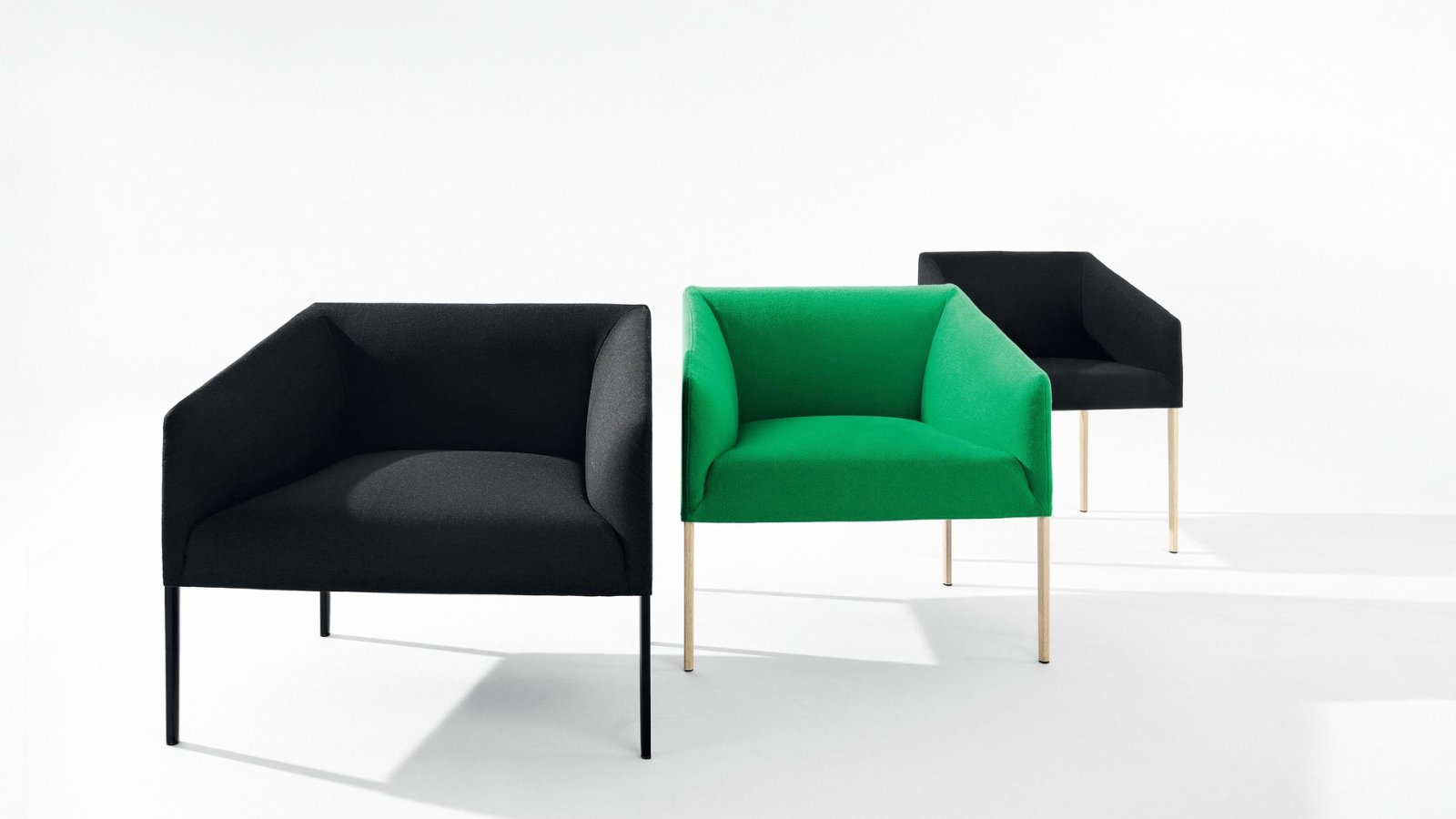Saari armchair by Arper in the larger size, upholstered in leather