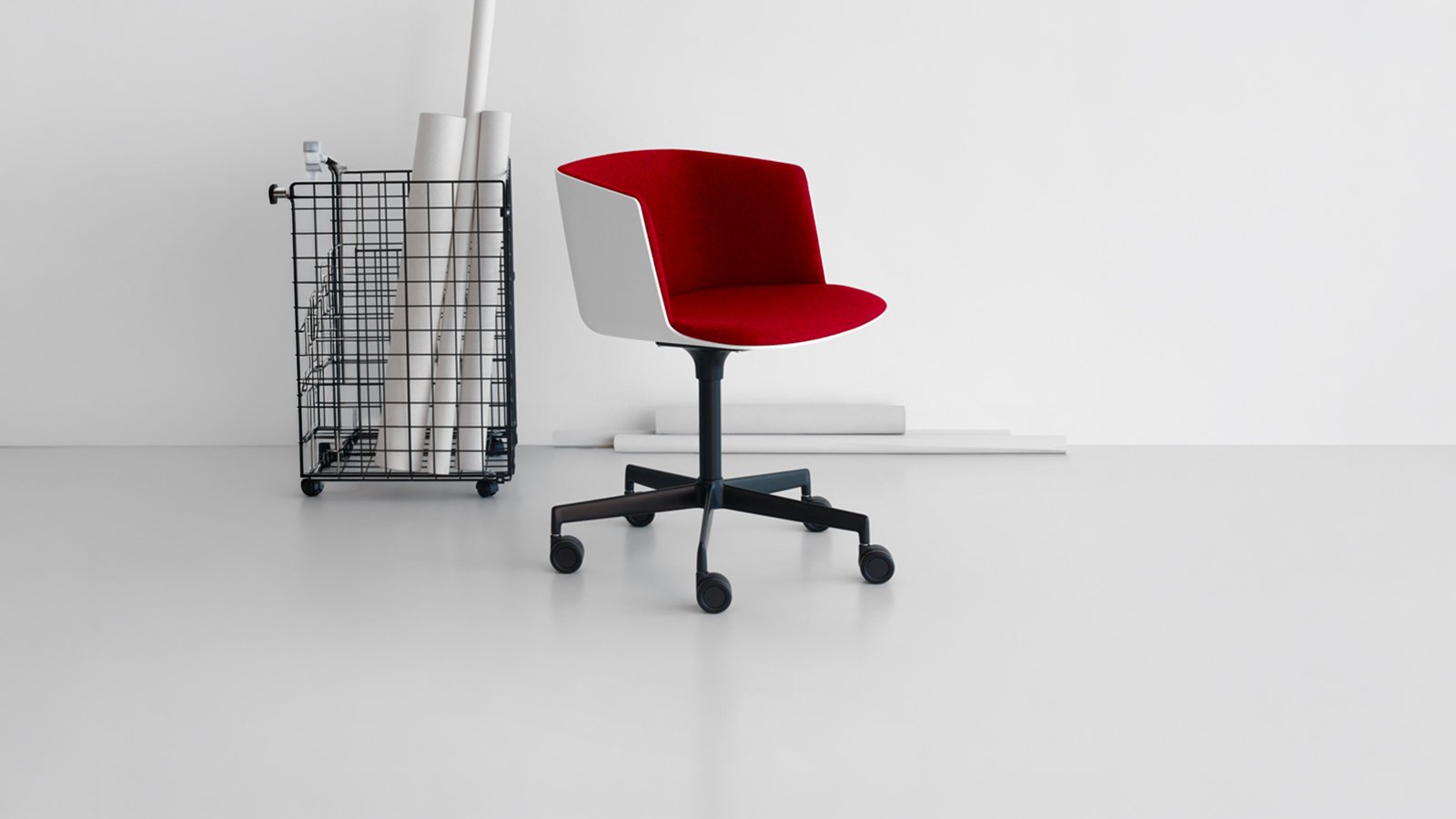 Cut armchair by Lapalma rolling on self-braking castors