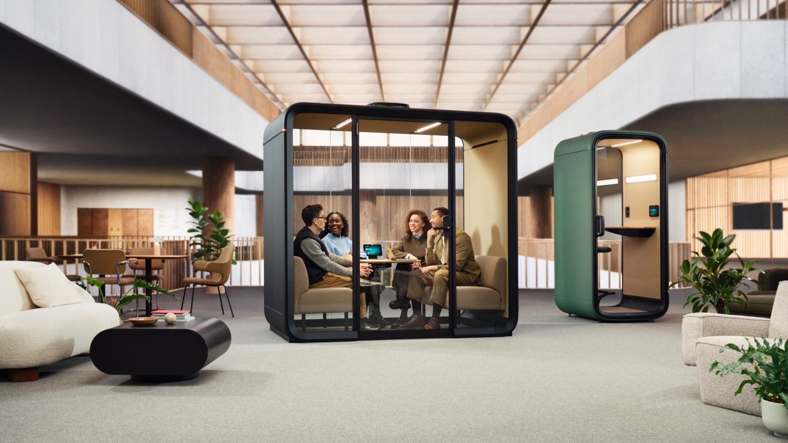 Framery Four glass meeting pod on an American office floor