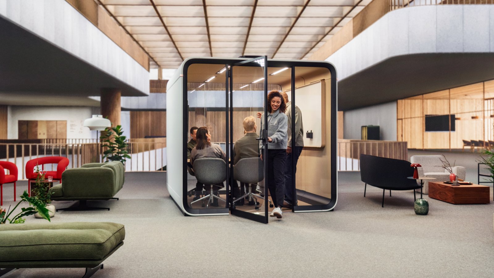 Team of six meeting inside the Framery Six pod