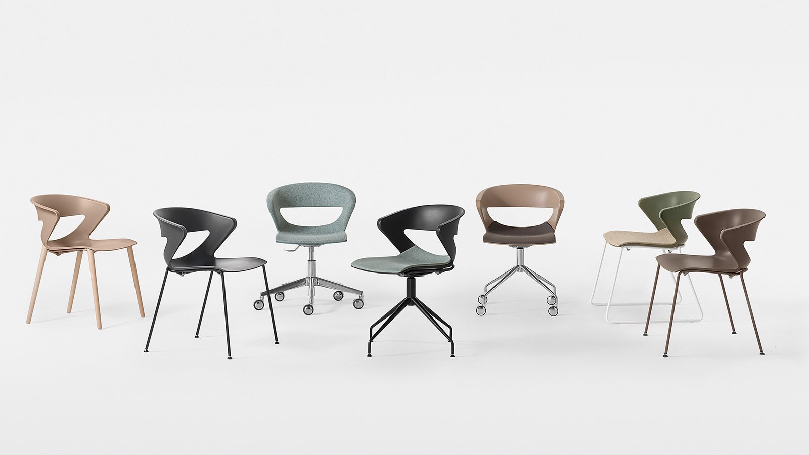 Four-leg Kicca conference chairs by Kastel lined up along a walnut boardroom table