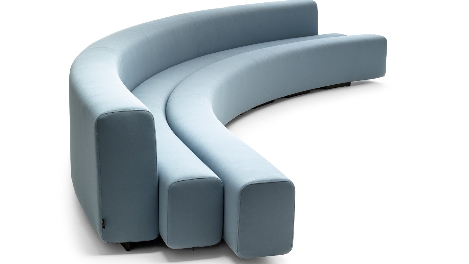 Osaka sofa and backless bench by LaCividina in one run across a lobby