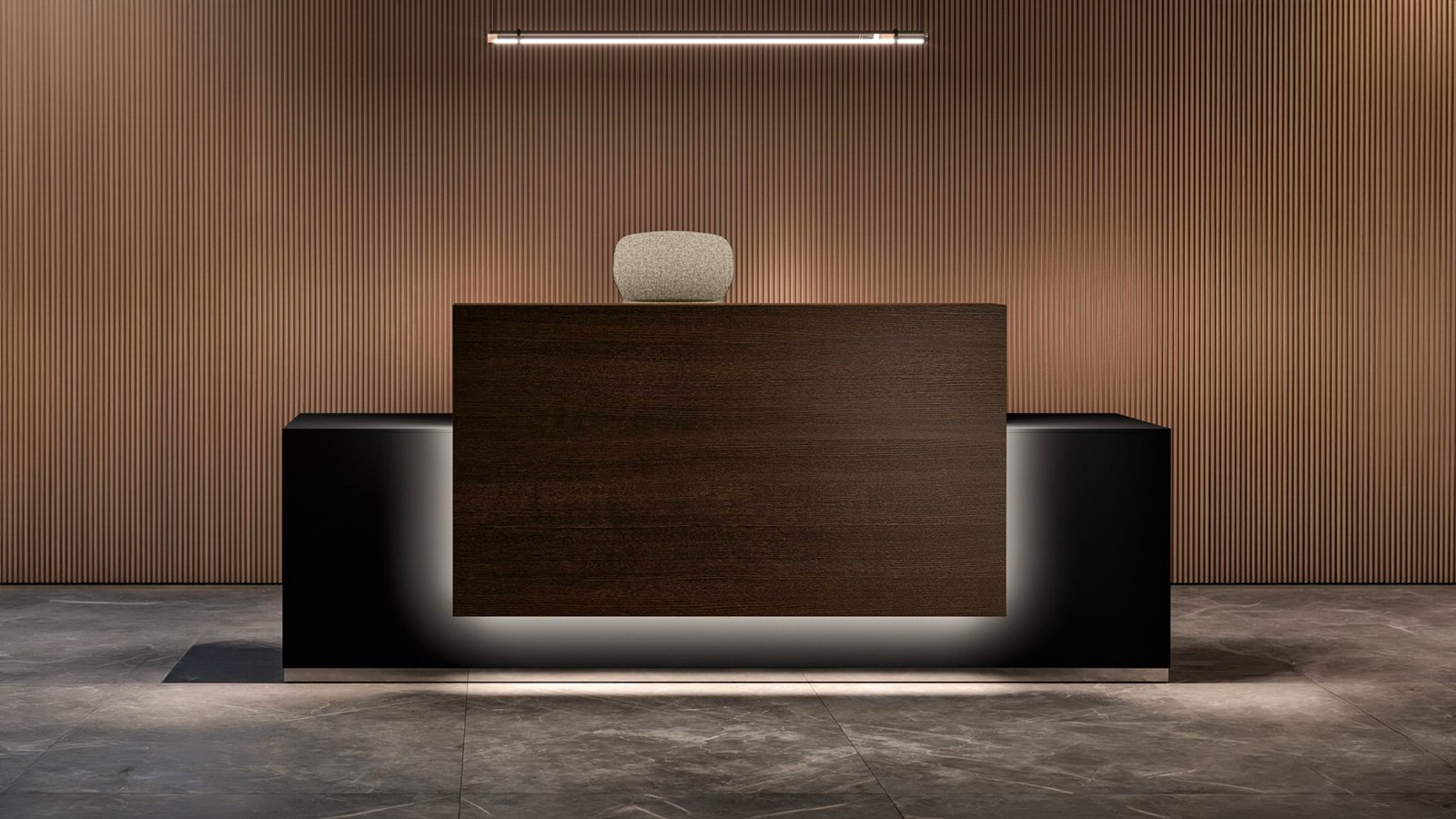Lux reception counter by Bralco in a busy American lobby