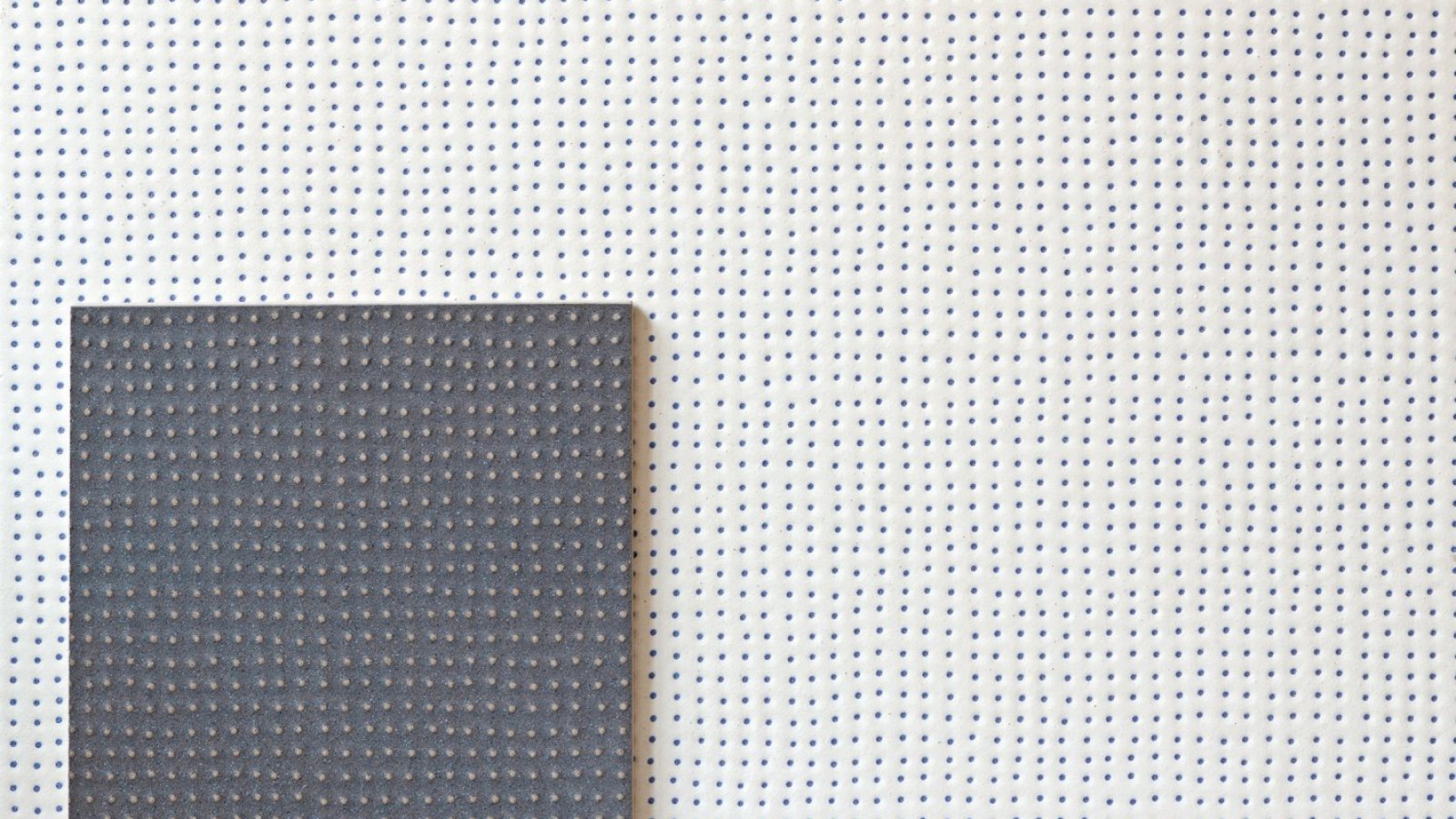 Pico by Mutina porcelain in Down Natural Blanc with recessed dots