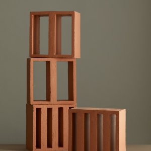Daylight patterns cast through a Tally wall
