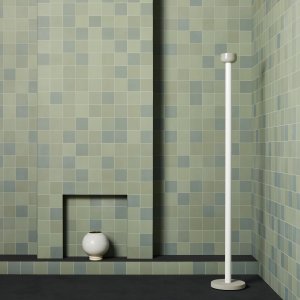 Restroom suite wrapped in Mews Light Blue from floor to wainscot height