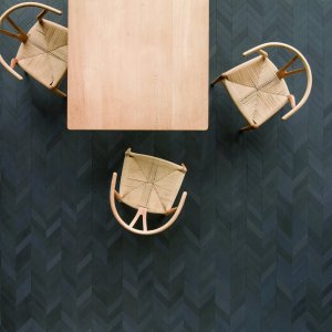Reception backdrop wall tiled in Mews Soot