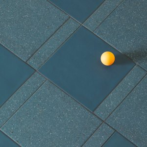 Commercial interior floor tiled in Mutina Time