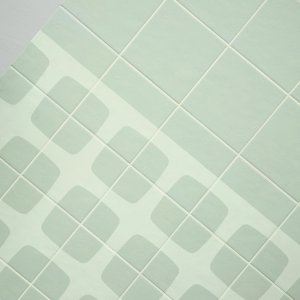 Betty porcelain floor mixing plain and patterned tiles