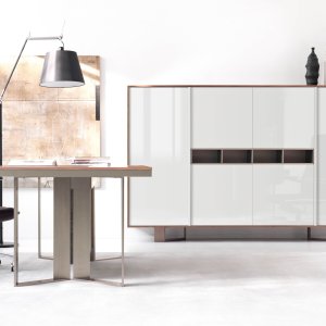 Slide-out desk pad in Brown faux leather opening over the cable compartment of the Lloyd desk