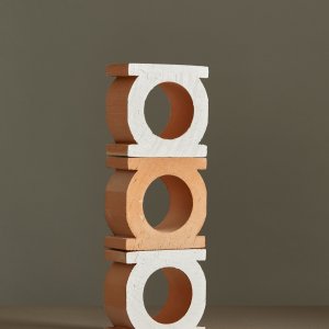 Jali Bianco glazed block next to natural clay finish