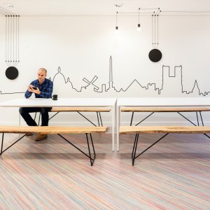 Home office with an Arper Nuur table at 29.1 in height