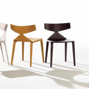 Saya designer chair by Arper with oak veneered shell in a dining room