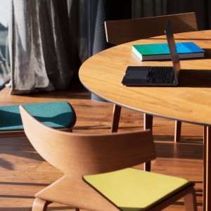 Home office with an Arper Saya chair at a desk