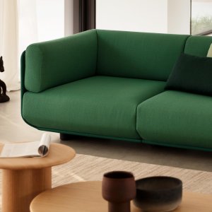 Shaal sofa along a glass wall in a lobby