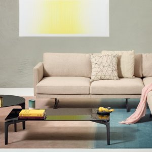 Two-seat Steeve Lou sofa on its T-leg base