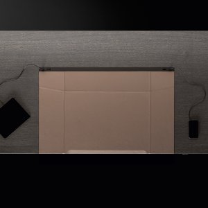 Eleva desk raised for standing work in a US corner office