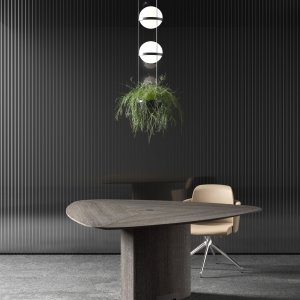 Stitched leather insert detail on a Trilo table