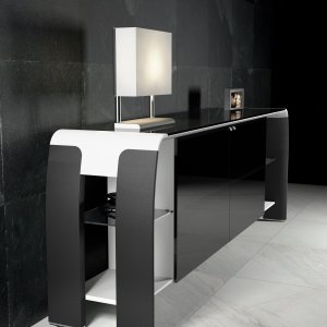 Chrome-plated band with adjustable feet on the leg of a Codutti desk