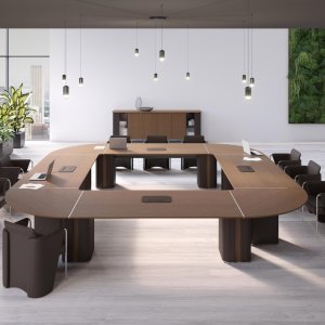 Coupè executive chair in perforated leather at an AlfaOmega desk
