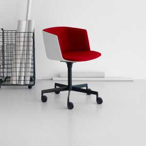 Cut armchair by Lapalma rolling on self-braking castors