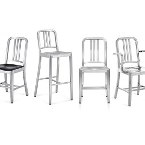 Designer chairs Navy 1006 by Emeco in brushed aluminum at a restaurant table