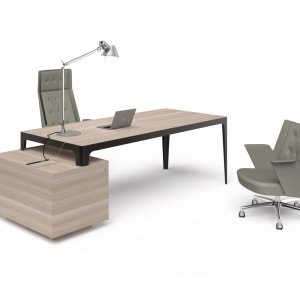 Tapered metal leg of the Grand More desk, 2⅜ in at the top and 1⅝ in at the foot
