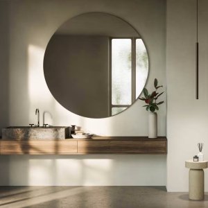 Wall mounted Icona faucet above a vessel