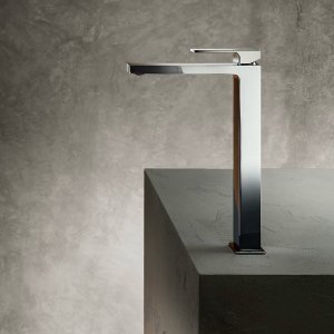 Powder room with designer faucets: Fantini Mint mounted on the wall