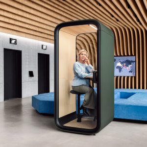 Occupancy dashboard concept beside a Framery One Compact booth