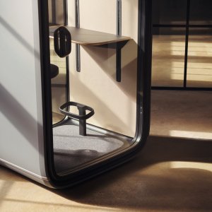 Executive on a video call inside the Framery One pod