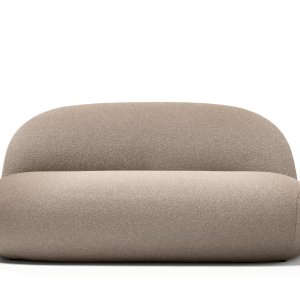 Ottoman and armchair of the Hill collection sharing one footprint