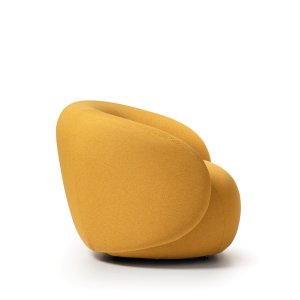 Hill armchair by Quinti without armrests in front of a glass wall
