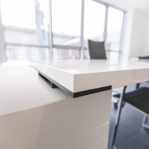 New Loop desktop in dark brown elm laminate finish