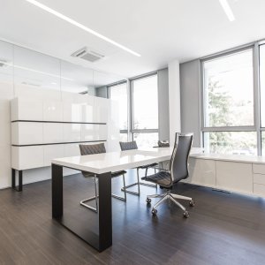 Matte bronze frame version of the New Loop executive desk