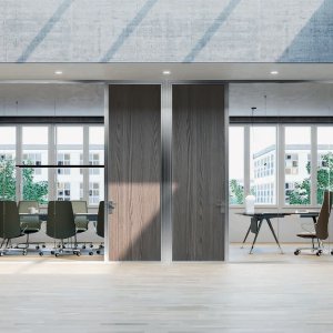 K42 glass partition wall by Frezza dividing an American office suite
