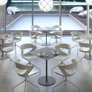 Kicca on a four-foot swivel base with no casters at a small round table