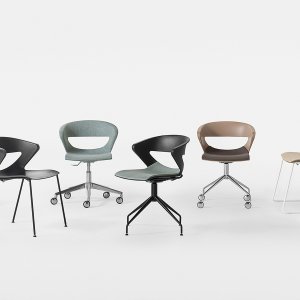 Four-leg Kicca conference chairs by Kastel lined up along a walnut boardroom table