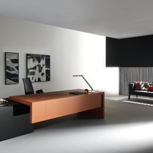 Leather-wrapped top and leg of a black Kyo desk