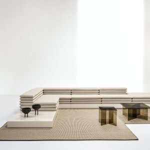 Freestanding island of Acamante seating at the center of a hotel lounge