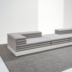 Gloss dark gray lacquer on the base of an Acamante sofa, three-quarter view