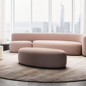 Lisse sofa from above, its curved footprint clear against the floor