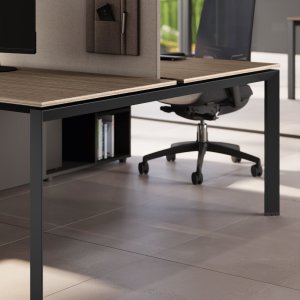 5th Element desking-bench by Las Mobili on trapezoidal drawn-steel legs in an open-plan office