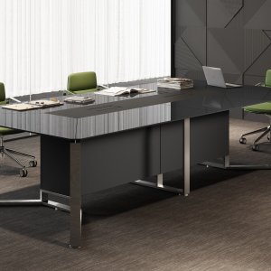 Aluminum top access with power sockets open on an I-Meet table