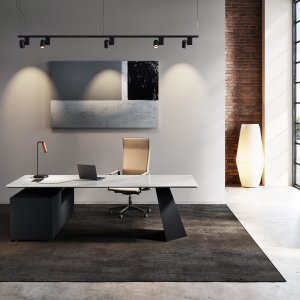 Rust epoxy-coated steel frame and cable tray under the Monolith desk top