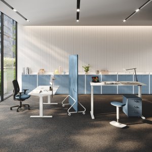 UP sit-stand operative desk by Las Mobili raised to standing height with black T legs