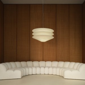 Array side table set between two upholstered modules