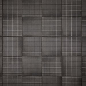 Executive washroom wall in Aurore Charcoal Grid L porcelain by Mutina